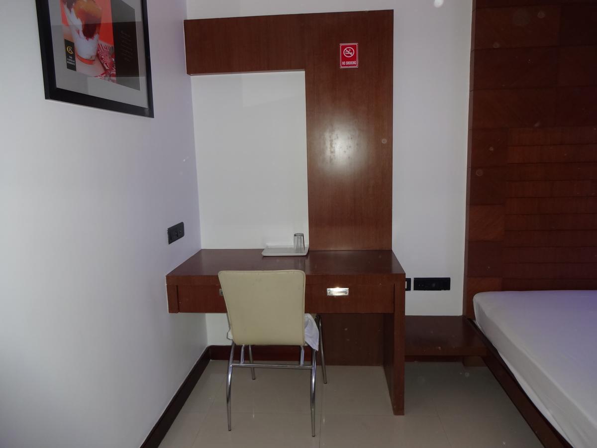 Hotel The Castello Residency à Coimbatore Extérieur photo